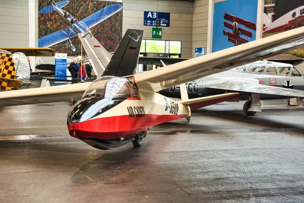 FRIEDRICHSHAFEN - May 2019: white red glider plane KA 7 1962 at Motorworld Classics Bodensee on May 11, 2019 in Friedrichshafen, Germany — стоковое фото