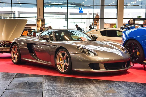 FRIEDRICHSHAFEN - MAY 2019: silver PORSCHE CARRERA GT 2002 at Motorworld Classics Bodensee on May 11, 2019 in Friedrichshafen, Germany — Stock Photo, Image