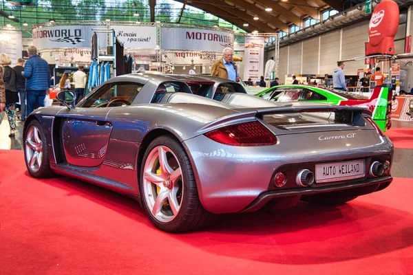 FRIEDRICHSHAFEN - MAY 2019: silver PORSCHE CARRERA GT 2002 at Motorworld Classics Bodensee on May 11, 2019 in Friedrichshafen, Germany — Stock Photo, Image