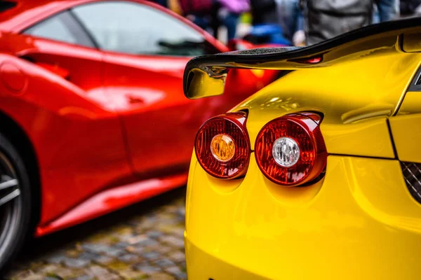 GERMANY, FULDA - JUL 2019: rearview lights of yellow FERRARI F430 Type F131 cabrio is a sports car produced by the Italian automobile manufacturer Ferrari from 2004 to 2009 as a successor to the Ferra — Stock Photo, Image