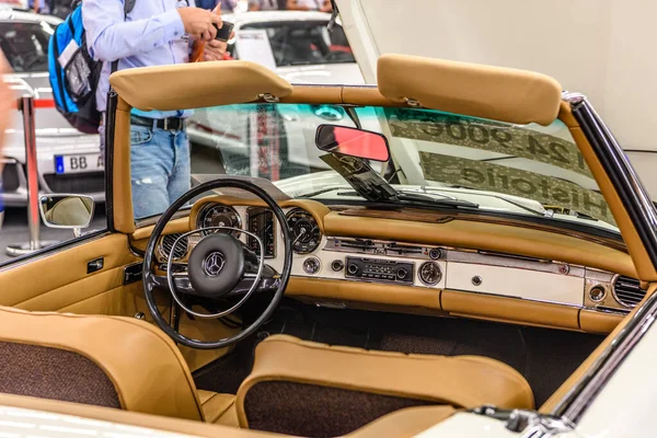 FRANKFURT, GERMANY - SEPT 2019: brown leather interior of MERCEDES 280 SL W113 cabrio roadster 1963 1971 with opened hood, IAA International Motor Show Auto Exhibtion — Stock Photo, Image