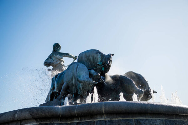 low angle view of famous Gefion Fountain in copenhagen, denmark  