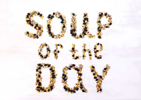 Soup of the day. Text made from various legumes. Food concept de — Stock Image Soup of the day. Text made from various legumes. Food concept de Royalty Free Stock Images