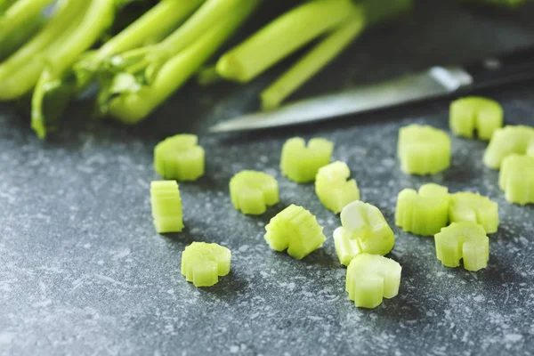 Fresh celery on stone background. — Stock Photo, Image