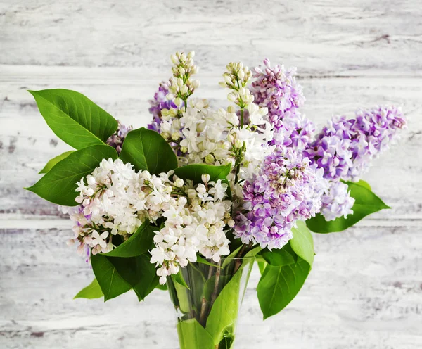 Bouquet lilla in vaso — Foto Stock