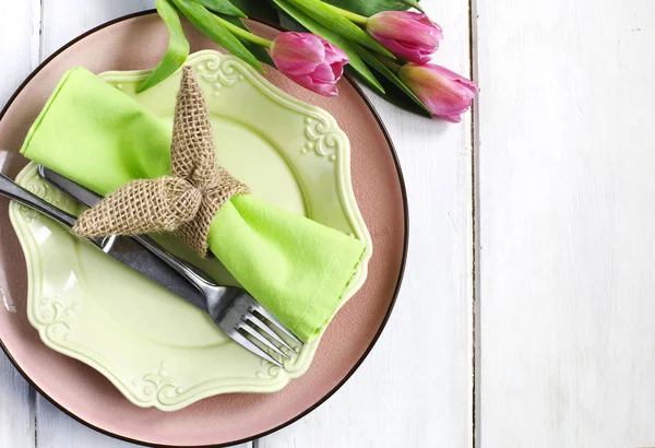 Easter table setting with fresh tulips, top view — Stock Photo, Image