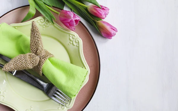 Easter table setting with fresh tulips, top view — Stock Photo, Image