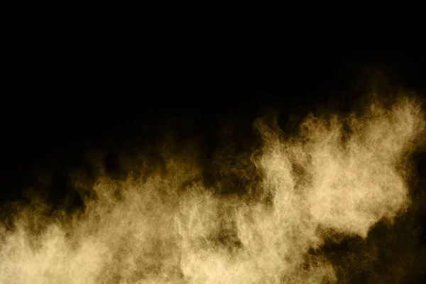 黑色背景下的金色粉末爆炸冻结动议 — 图库照片