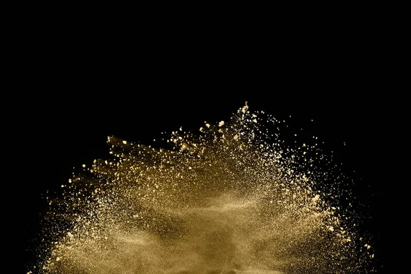 Gyllene Pulver Explosion Svart Bakgrund Frysrörelse — Stockfoto