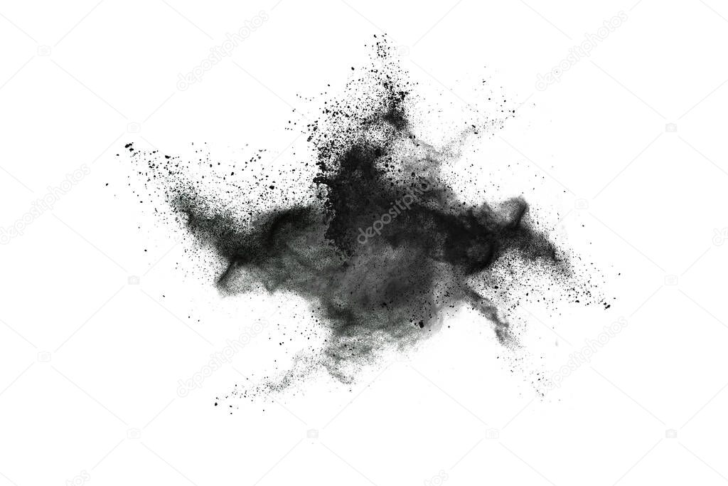 particles of charcoal on white background,abstract powder splatted on white background,Freeze motion of black powder exploding or throwing black powder.