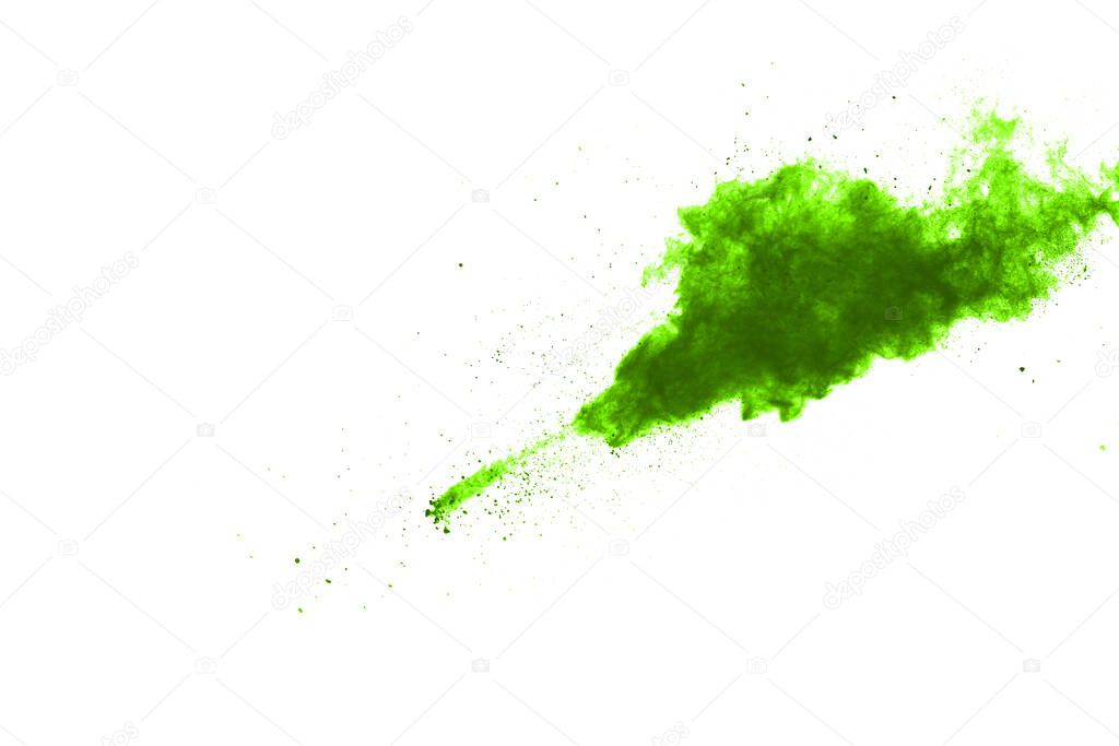 Green powder explosion on white background. Colored cloud. Colorful dust explode. Paint Holi.