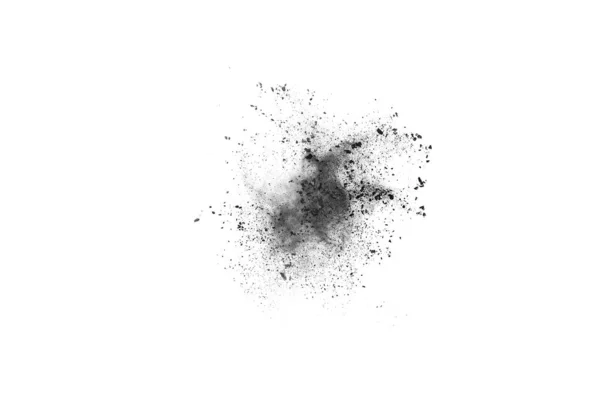 stock image particles of charcoal on white background,abstract powder splatted on white background,Freeze motion of black powder exploding or throwing black powder.