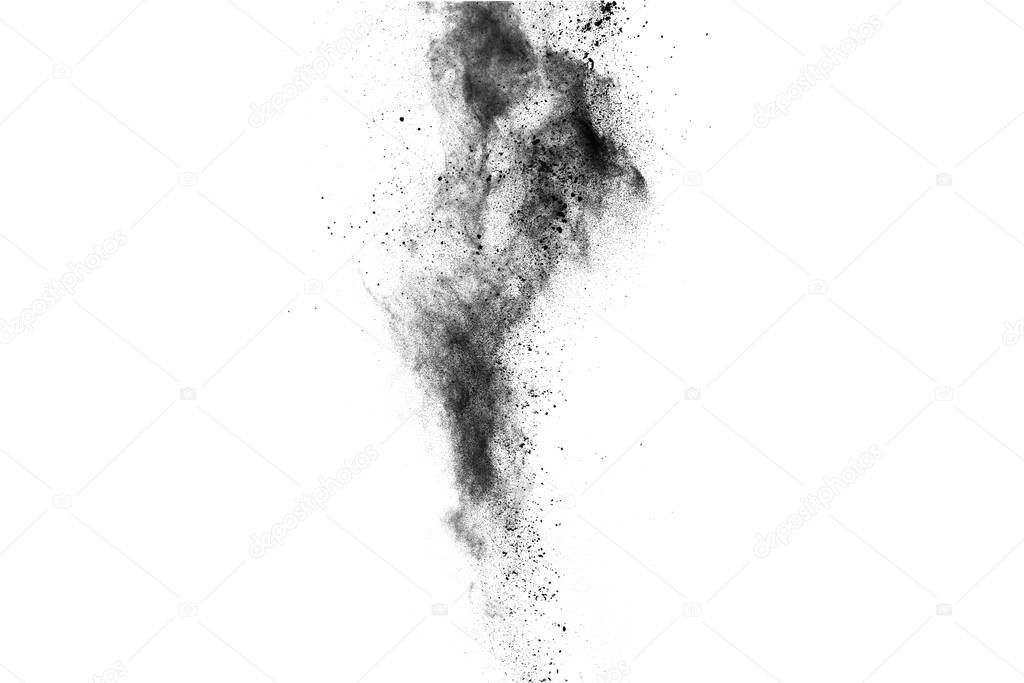 particles of charcoal on white background,abstract powder splatted on white background,Freeze motion of black powder exploding or throwing black powder.