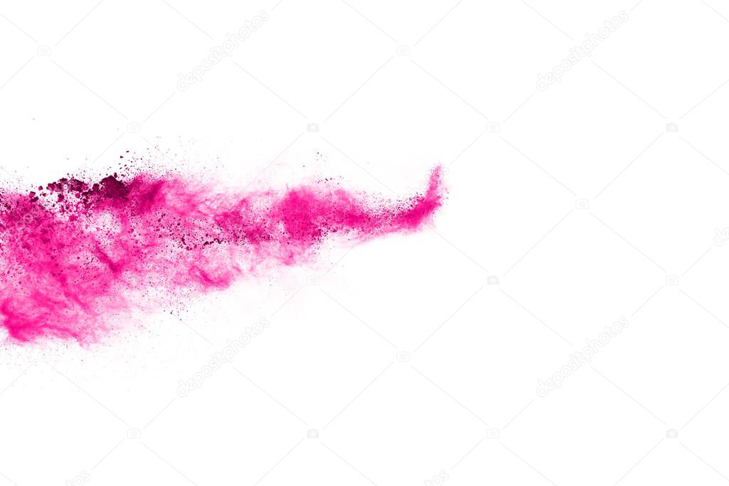 Abstract pink powder splatted background,Freeze motion of color powder exploding/throwing color powder,color glitter texture on white background.