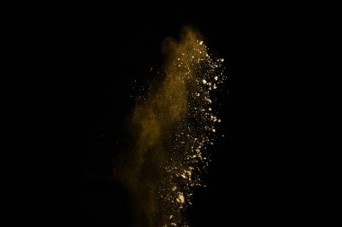 Siyah arka planda altın tozu patlaması. Renkli bulut. Renkli toz patlar. Boya Holi.