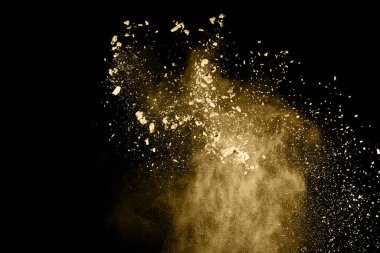 Siyah arka planda altın tozu patlaması. Renkli bulut. Renkli toz patlar. Boya Holi.