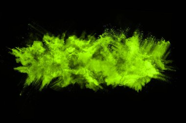 Soyut toz patlamasının hareketi siyah arka planda donmuş yeşil. Siyah zemin üzerindeki toz yeşilinin hareketini durdur. Patlayıcı tozu siyah arkaplanda yeşil.