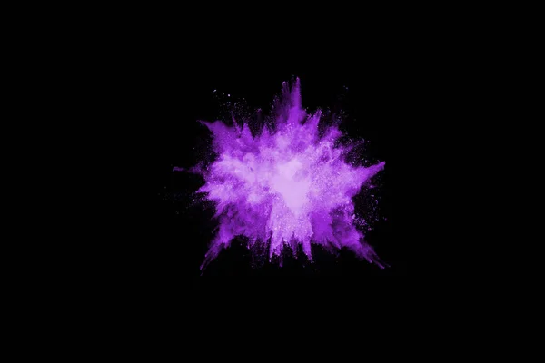 The movement of abstract dust explosion frozen purple on black background. Stop the movement of powdered purple on black background. Explosive powder purple on black background.