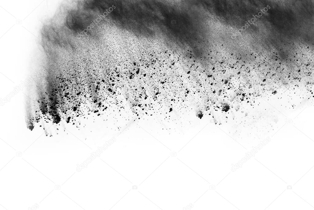 particles of charcoal on white background,abstract powder splatted on white background,Freeze motion of black powder exploding or throwing black powder.