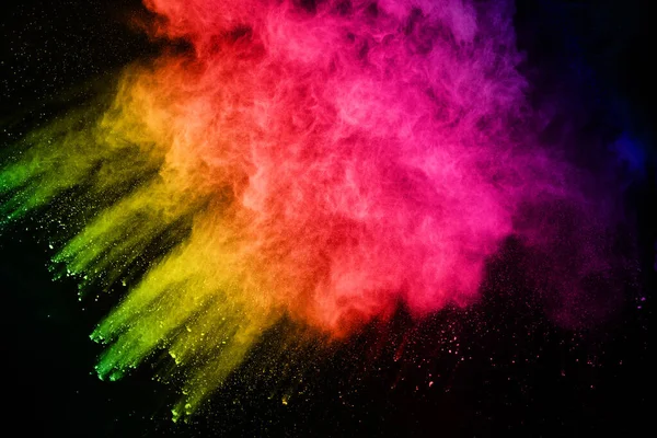 abstract colored dust explosion on a black background.abstract powder splatted background,Freeze motion of color powder exploding/throwing color powder, multicolored glitter texture.