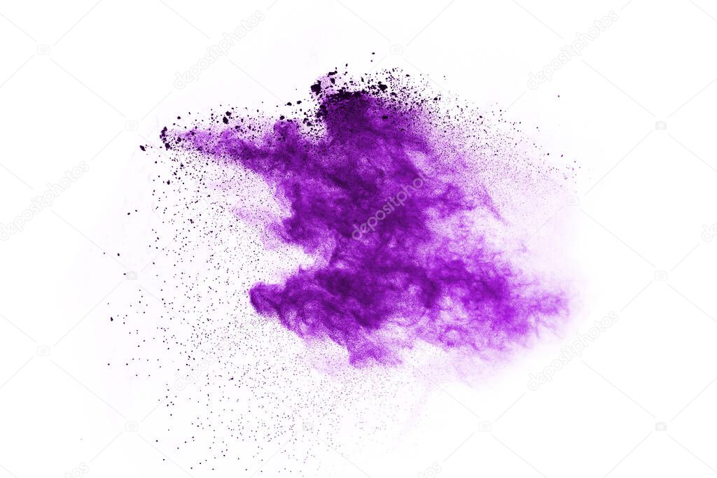 Powder explosion. Closeup of a purple dust particle explosion isolated on white. Abstract background.