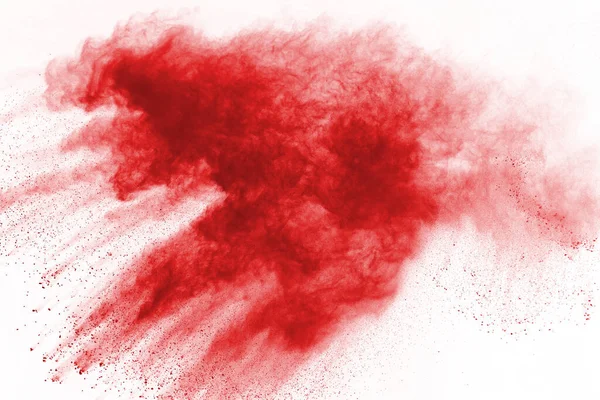 Beyaz arka planda izole edilmiş kırmızı barutun patlaması hareketsiz. Kırmızı toz bulutunun soyut tasarımı. Parçacık patlaması ekran koruyucusu, duvar kağıdı