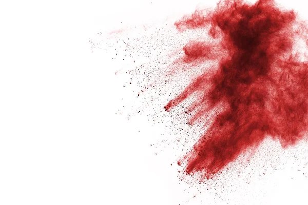 Beyaz arka planda izole edilmiş kırmızı barutun patlaması hareketsiz. Kırmızı toz bulutunun soyut tasarımı. Parçacık patlaması ekran koruyucusu, duvar kağıdı
