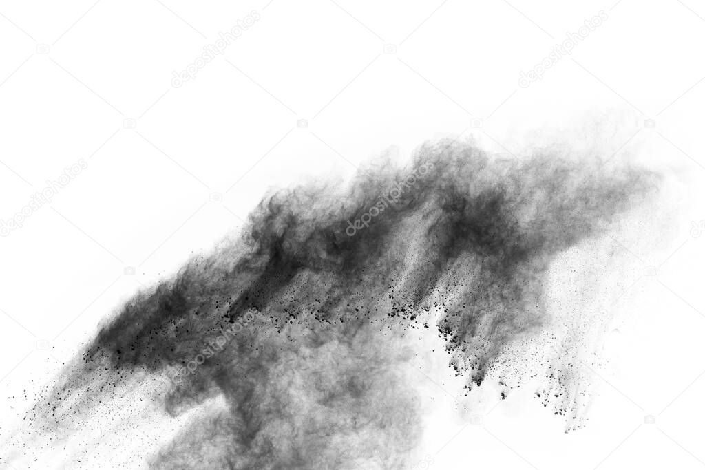 particles of charcoal on white background,abstract powder splatted on white background,Freeze motion of black powder exploding or throwing black powder.