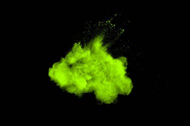 Soyut toz patlamasının hareketi siyah arka planda donmuş yeşil. Siyah zemin üzerindeki toz yeşilinin hareketini durdur. Patlayıcı tozu siyah arkaplanda yeşil.