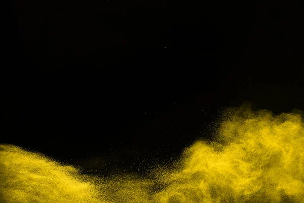 Freeze Motion Yellow Dust Explosion Isolated Black Background — Stock Photo, Image