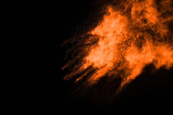 Orange Pulver Explosion Svart Bakgrund Färgat Moln Färgstarkt Damm Exploderar — Stockfoto