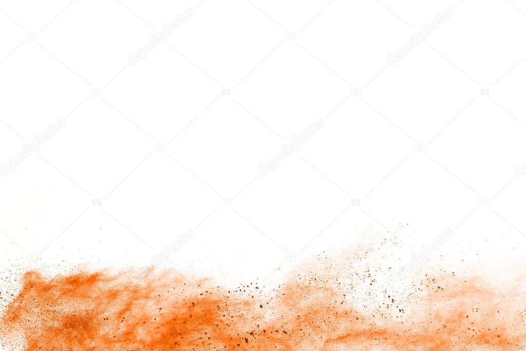 abstract orange powder splatted background,Freeze motion of color powder exploding/throwing color powder,color glitter texture on white background.