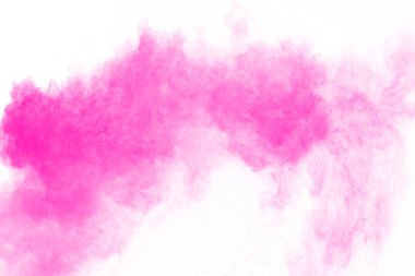 Soyut pembe toz sıçramış arkaplan, patlayan renk tozunun hareketsiz hareketi / renk pudrası, beyaz arkaplanda renk parıltısı dokusu.