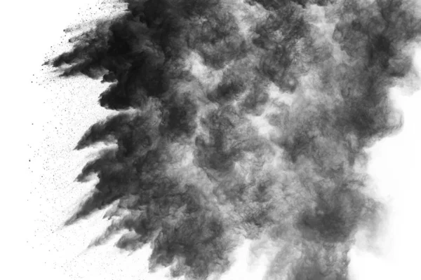particles of charcoal on white background,abstract powder splatted on white background,Freeze motion of black powder exploding or throwing black powder.
