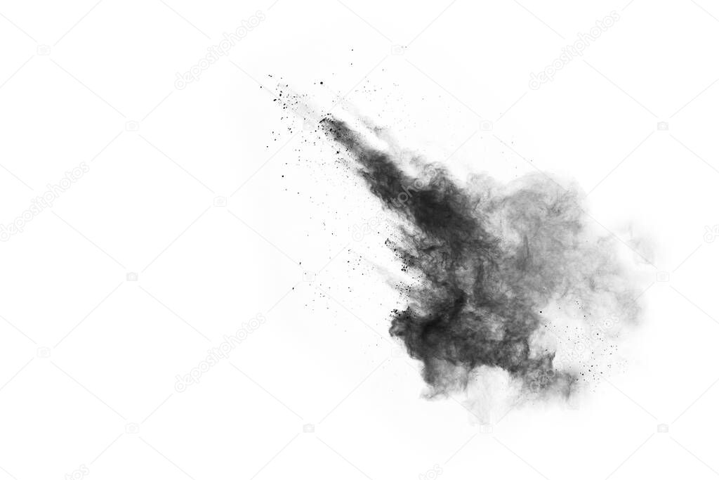 particles of charcoal on white background,abstract powder splatted on white background,Freeze motion of black powder exploding or throwing black powder.