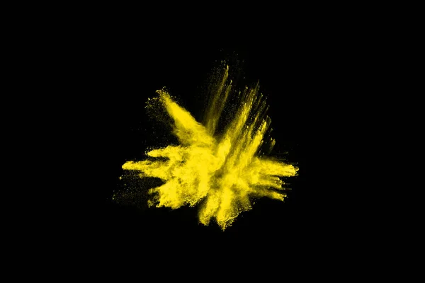 黒い背景に隔離された黄色の塵爆発の凍結運動 — ストック写真