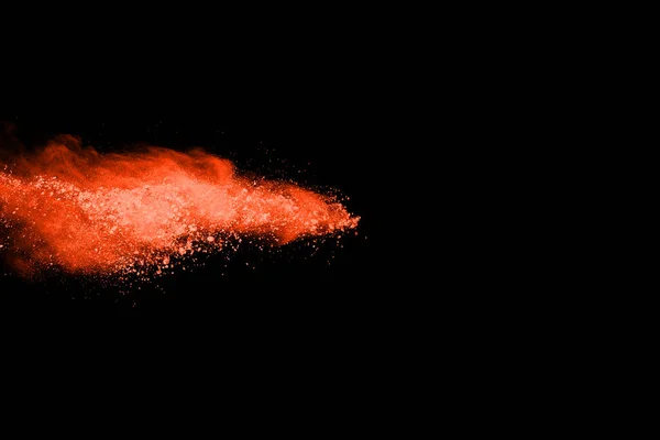 Frys Rörelse Orange Pulver Exploderar Isolerad Svart Bakgrund Abstrakt Design — Stockfoto