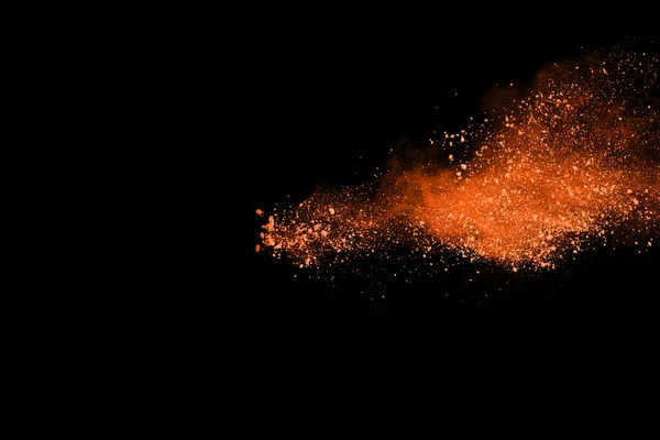 Freeze Motion Orange Powder Exploding Isolated Black Background Abstract Design — Stock Photo, Image