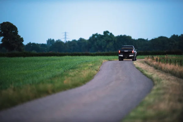 Pickup Truck Driving Country Road Evening — Stock Photo, Image