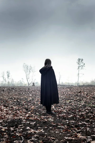 Woman Black Cape Moody Countryside — Stock Photo, Image
