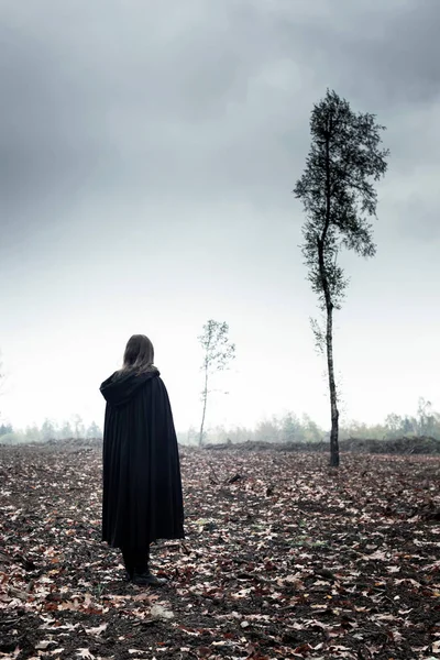 Woman Black Cape Moody Countryside — Stock Photo, Image