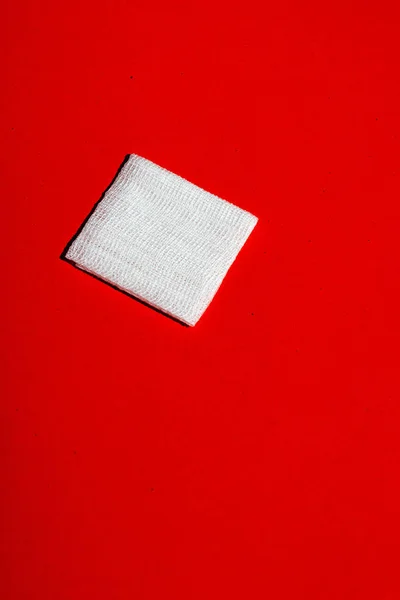 Maglia fasciatura sul pavimento rosso. Vista dall'alto . — Foto Stock