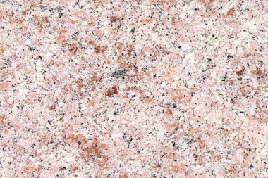 Mermer doku ile kırmızı, siyah ve beyaz parçacıklar