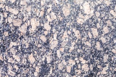 Mermer doku ile kırmızı, siyah ve beyaz parçacıklar