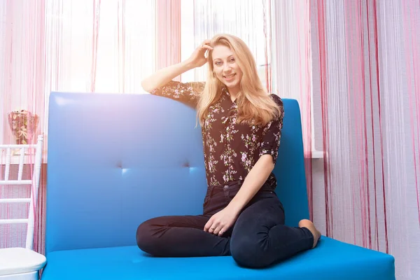 Concept Portrait Beautiful Blonde Girl Smiling Room Sitting Sofa Sun — Stock Photo, Image