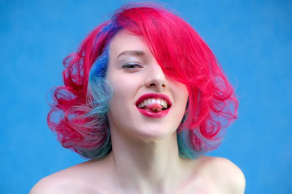 High fashion model woman with multi-colored hair posing in the studio, portrait of a beautiful sexy girl with a fashionable makeup and manicure. — Stock Photo, Image