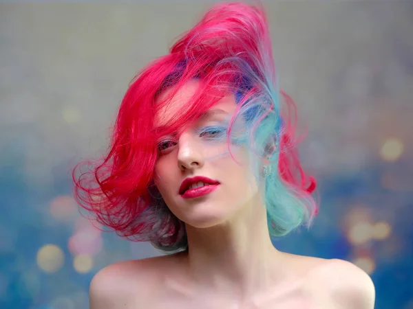 High fashion model woman with multi-colored hair posing in the studio, portrait of a beautiful sexy girl with a fashionable makeup — Stock Photo, Image