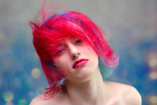 High fashion model woman with multi-colored hair posing in the studio, portrait of a beautiful sexy girl with a fashionable makeup — Stock Photo, Image