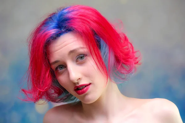 High fashion model woman with multi-colored hair posing in the studio, portrait of a beautiful sexy girl with a fashionable makeup — Stock Photo, Image