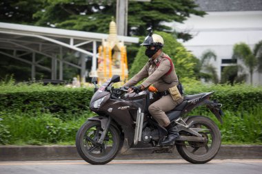 Motosiklet ve Polis Maejo Polis Karakolu. 